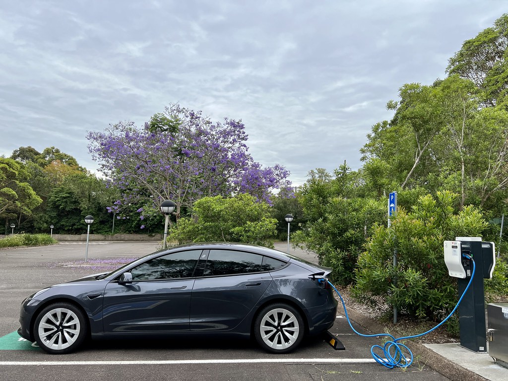 EV plugged into a public fast charger
