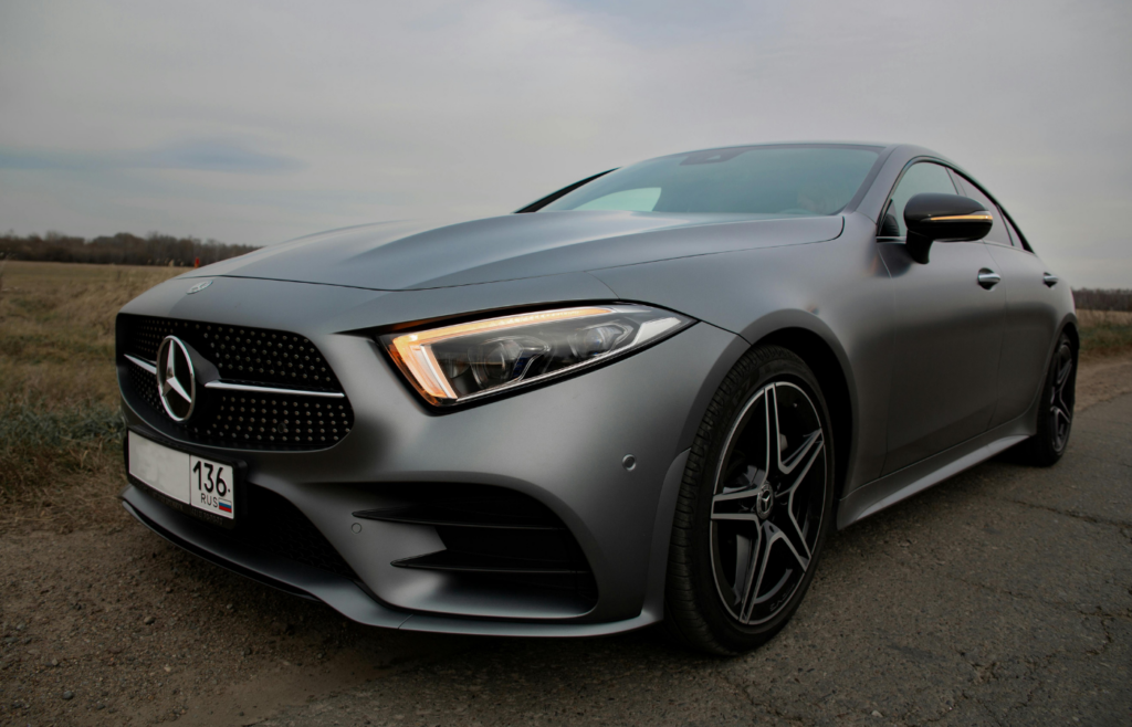 A car with wheels that look big