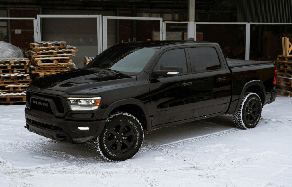 Black Pick-up Truck on Snow