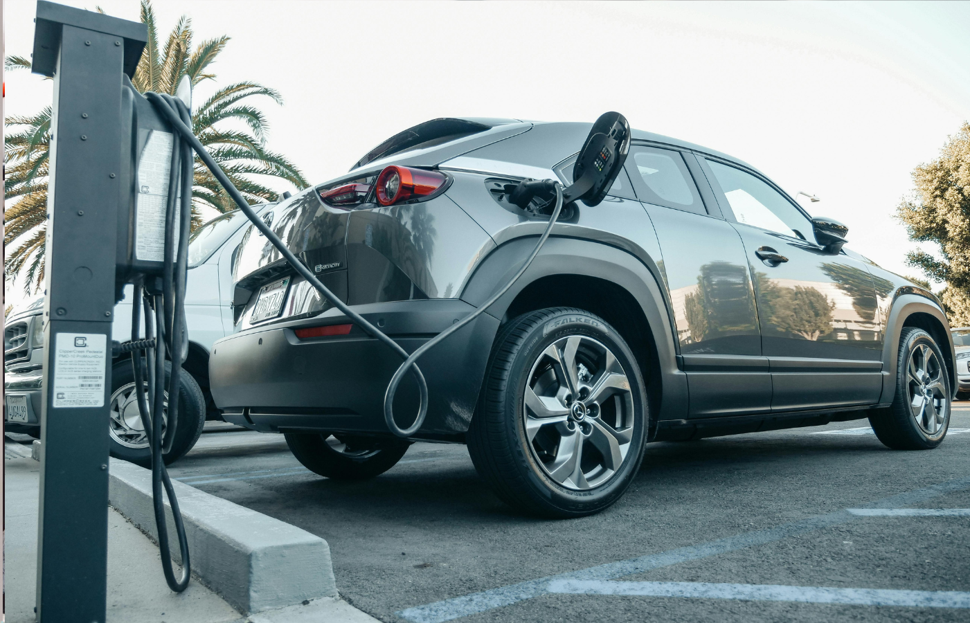 An EV charging pad built into a driveway