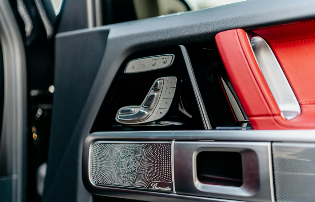 A luxury car’s audio system badge on the speaker