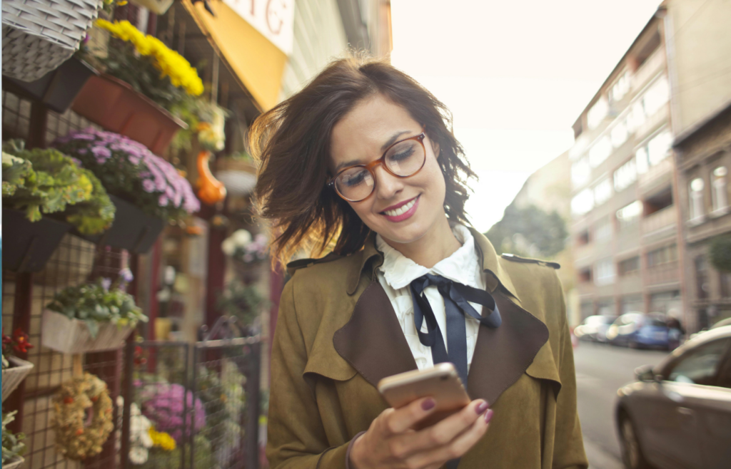 A person using glasses and smartphone