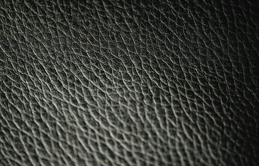 A close-up texture shot of a shark or synthetic material