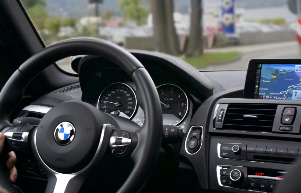 Person Driving Bmw Car