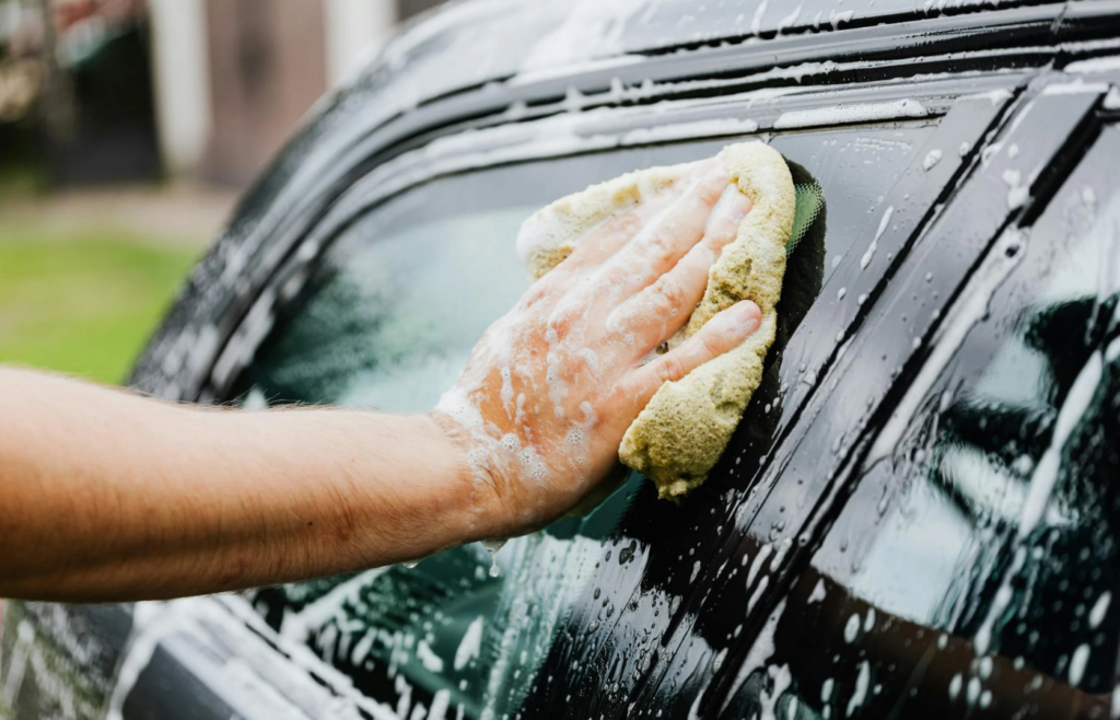 A car getting a wash with soap and suds