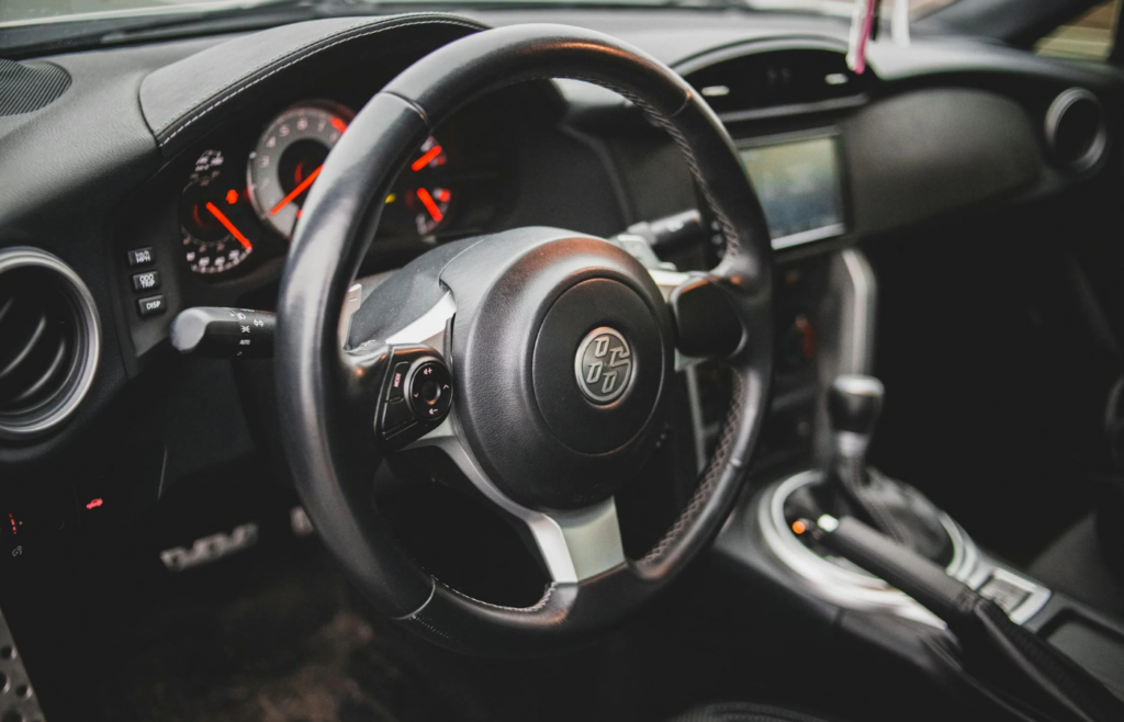 A glowing “Check Engine” light on the dashboard