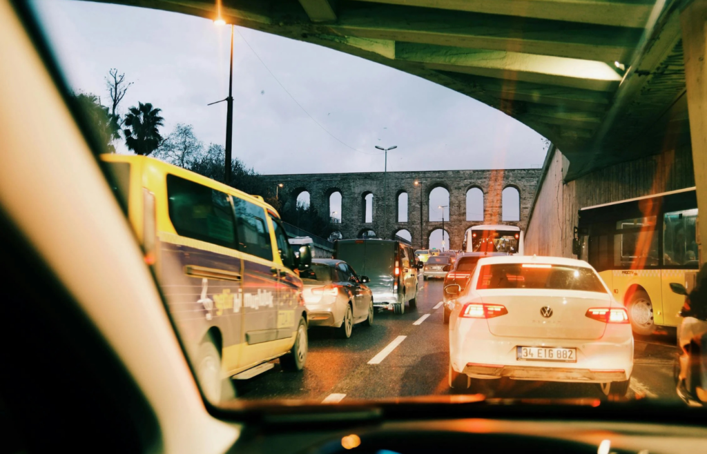A traffic jam or fuel station in a non-Western country