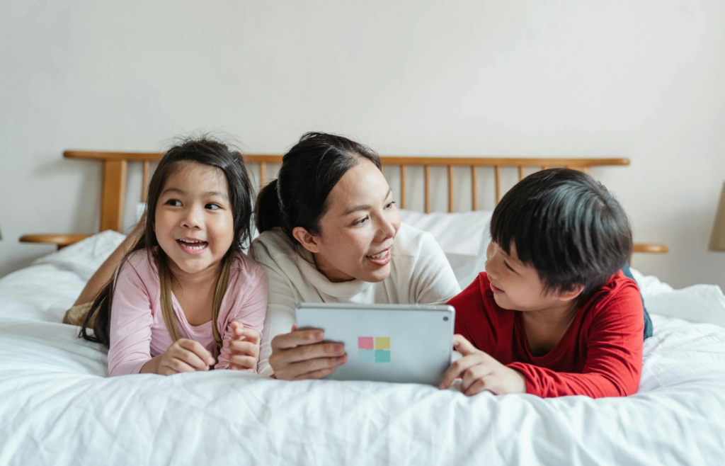 Parent using a tablet with a virtual assistant interface