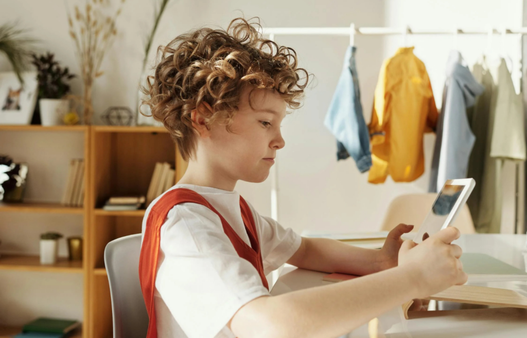 Toddler using a tablet device