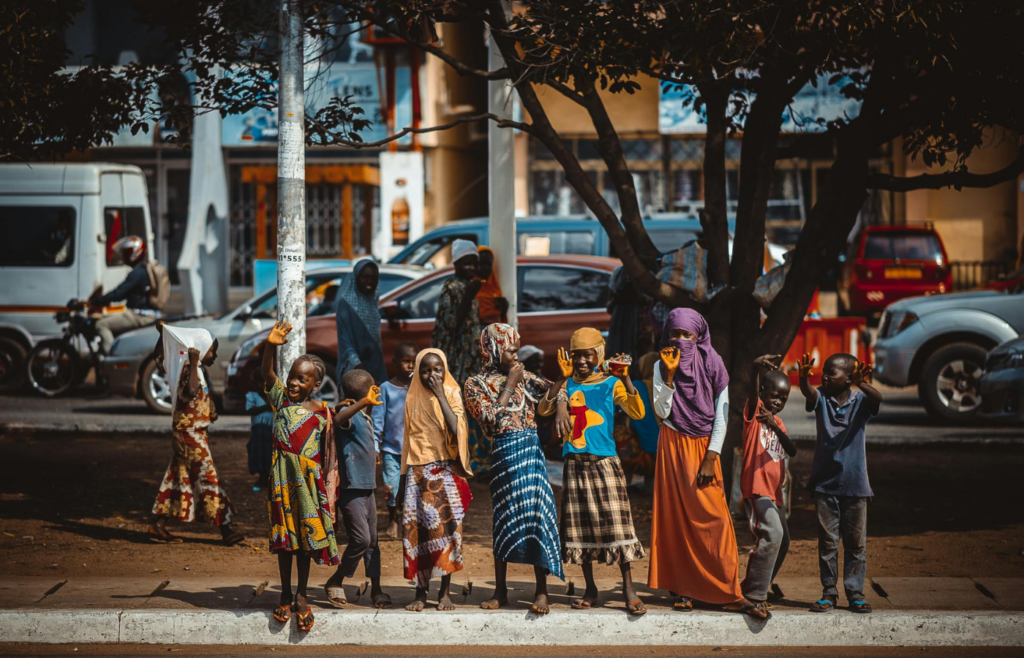 Diverse group of children engaged in a cultural activity