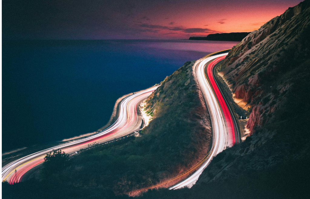 Time Lapse Photography of a Mountain Road at Night