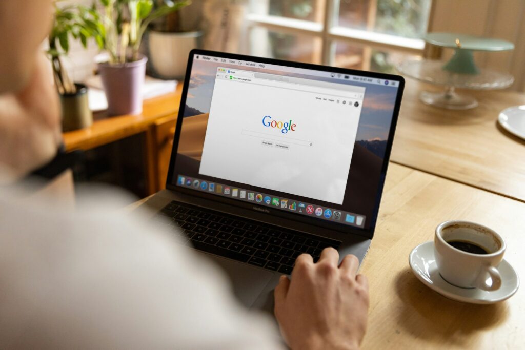 person browsing on laptop