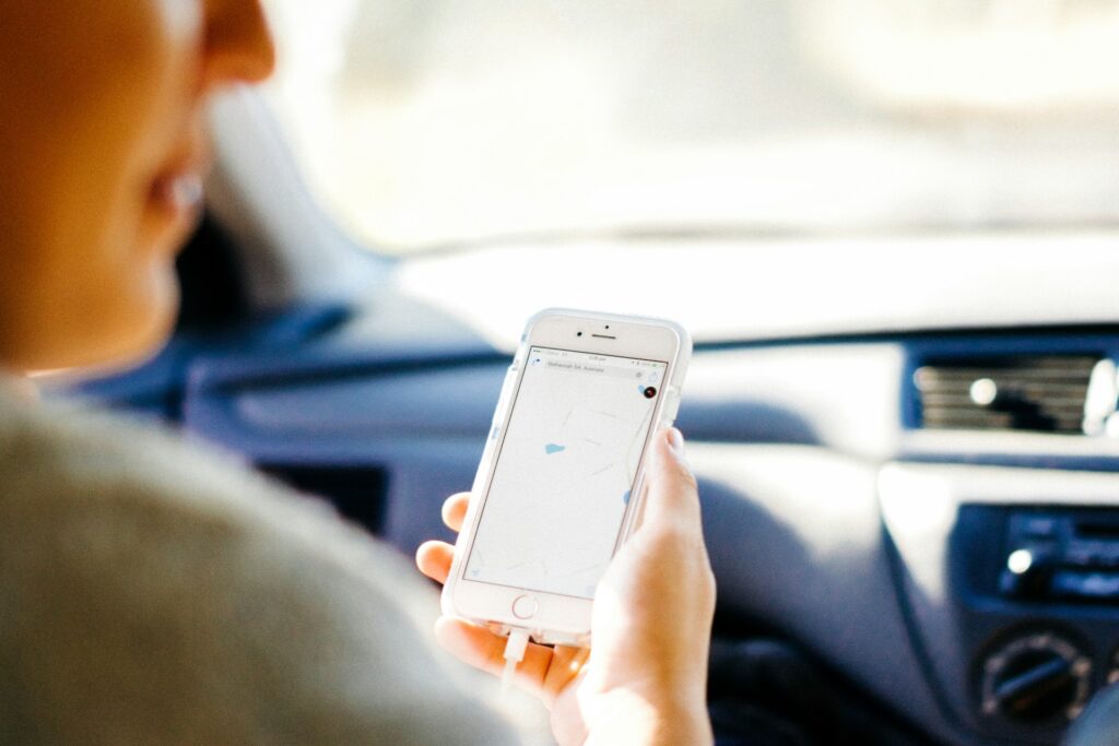 woman holding a mobile phone